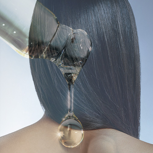 Cabelo liso e brilhante com óleo vegetal escorrendo, representando nutrição capilar e hidratação dos fios.